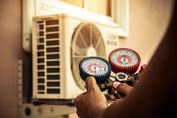 Professional Air Conditioning Service technician working in Lockbourne, OH